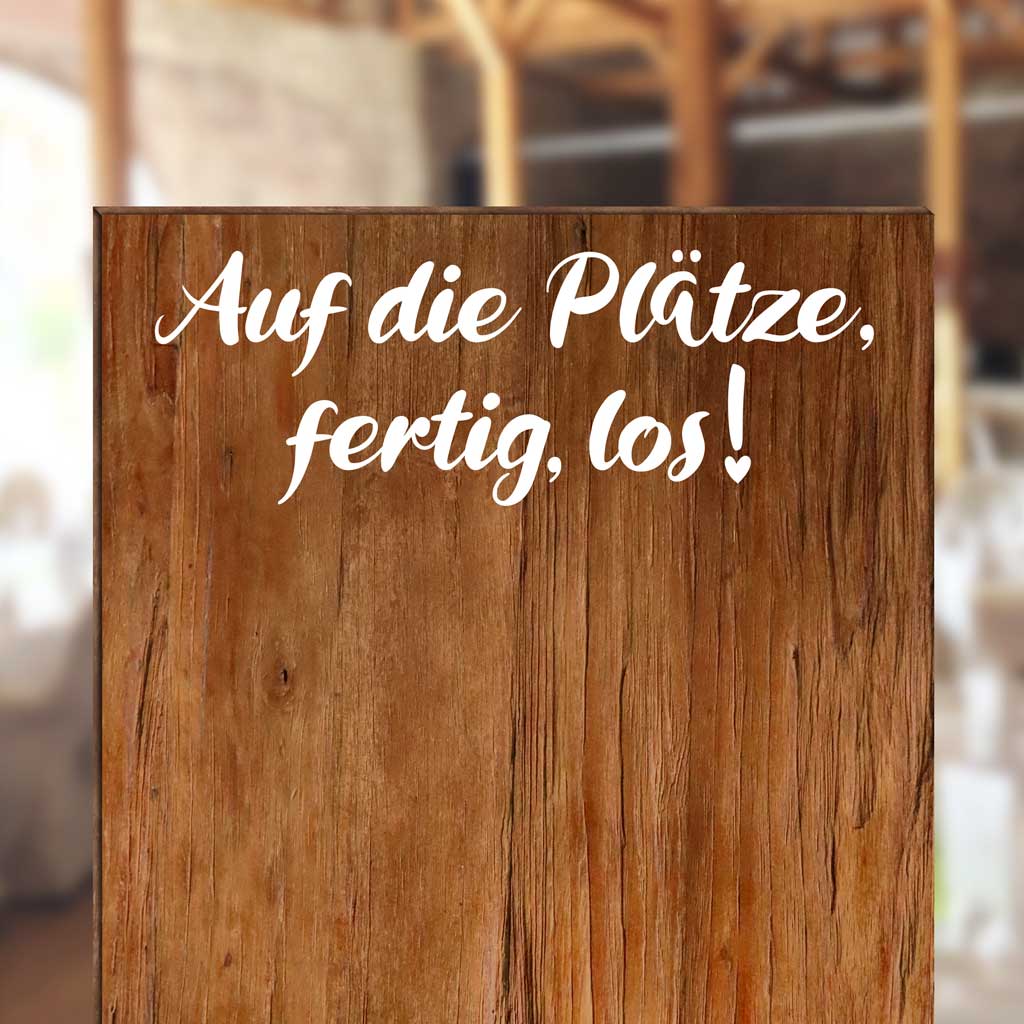 aufkleber mit Text "auf die plaetze fertig los" für tisch- und sitzpläne für die hochzeitsfeier