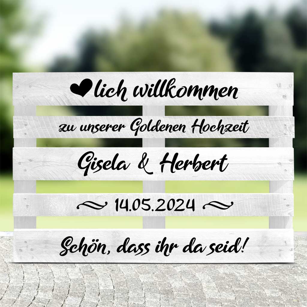 weisse Palette mit schwarzen Textaufklebern für die goldene Hochzeit