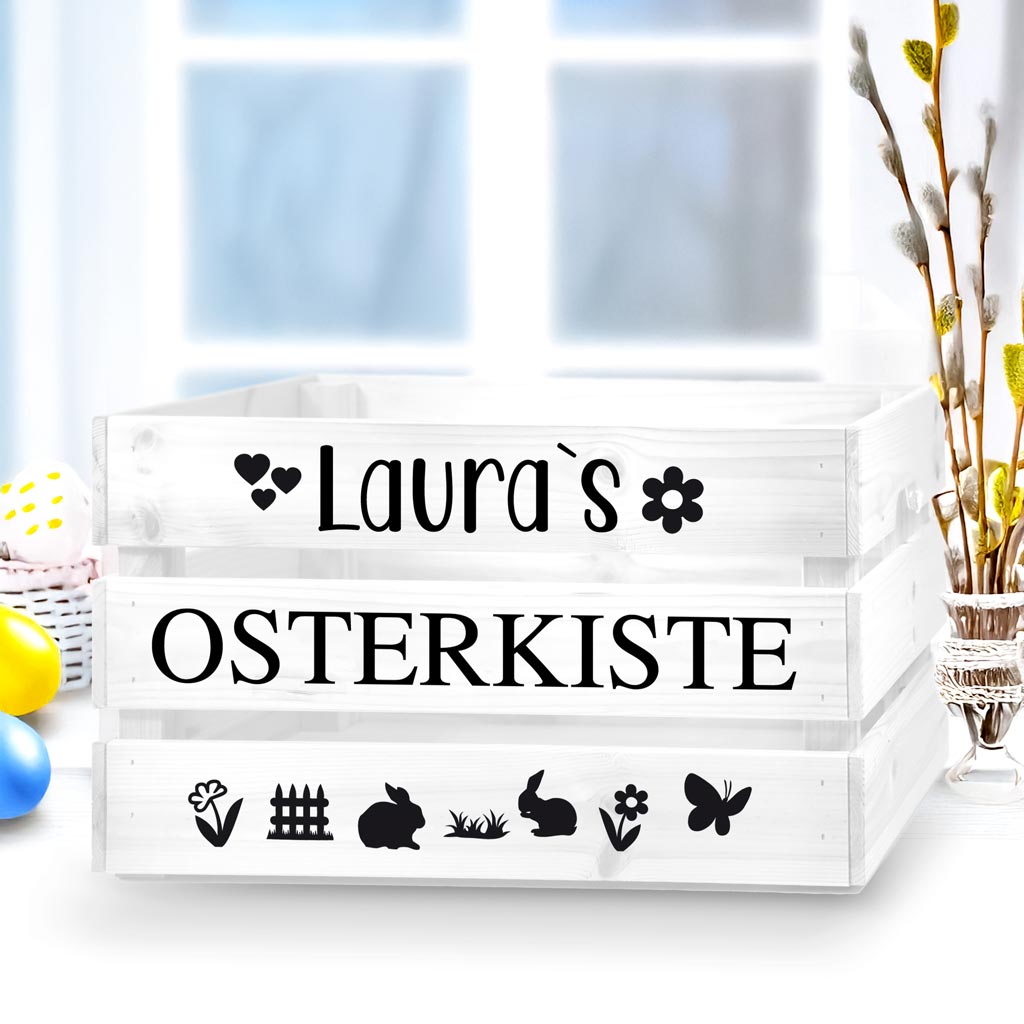 weisseholzkistemitschwarzemaufkleberzumbasteeinerosterkistemitkleinenostersymbolenhaseblumeschmetterlingzaungrasherzen